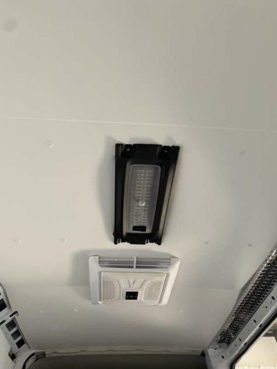black and white terminals on white van roof