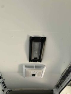 new refrigerator unit installed in a work van