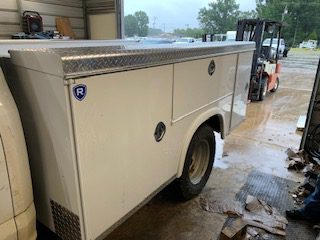 Recently repaired utility bed on work truck