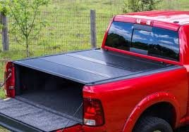 BAK truck bed cover installed on work truck with tailgate down