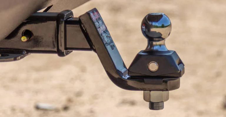 curt towing ball hitch installed on work vehicle