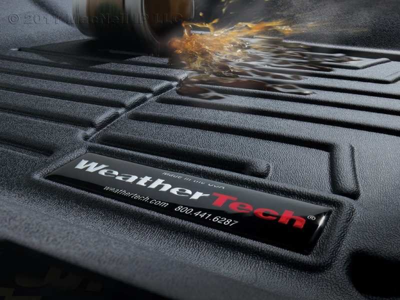 coffee spilling on weather tech floor liners installed in a work truck or work van