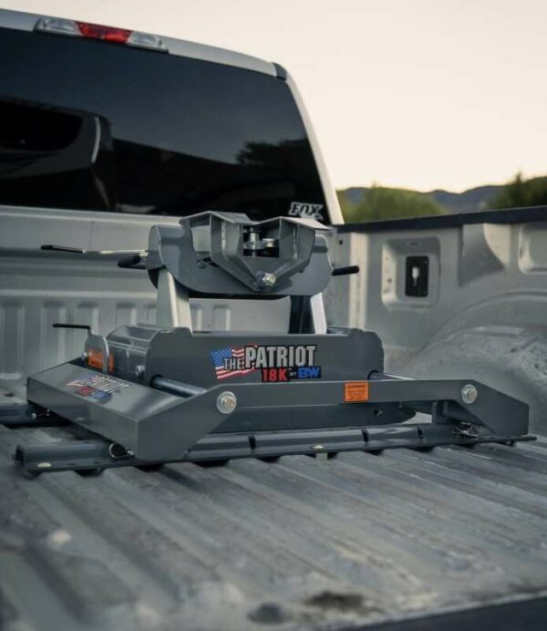 b&w heavy duty hitch bolted to bed of work truck