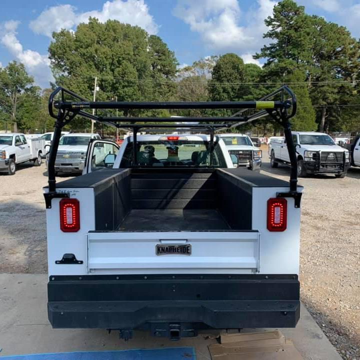 work truck with utility trailer and new ladder rack over bed
