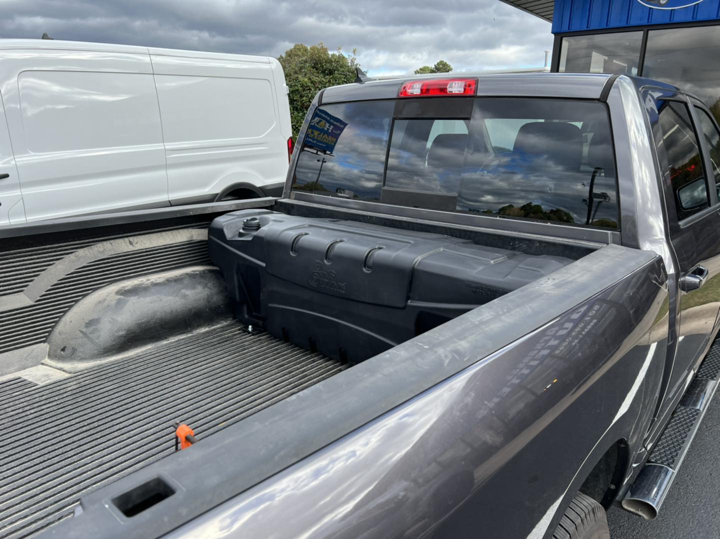 work truck with new gas tank installed in bed