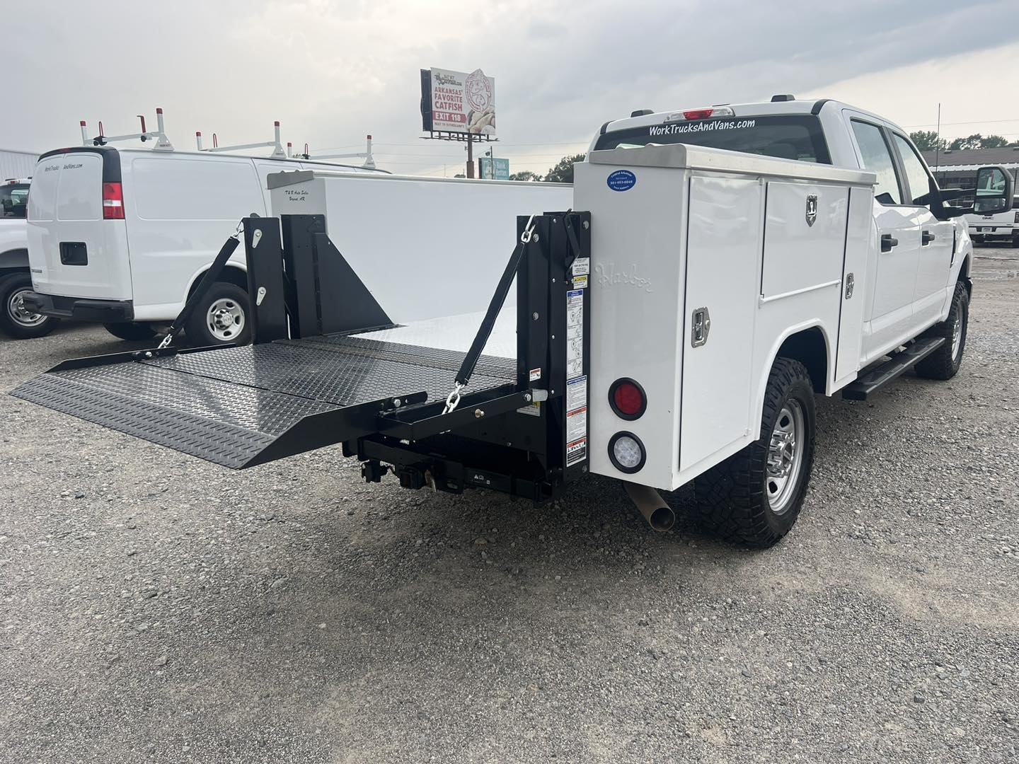 work truck with new liftgate installed with it down to show available space for lifting