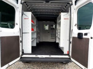 back of work van with shelving installed
