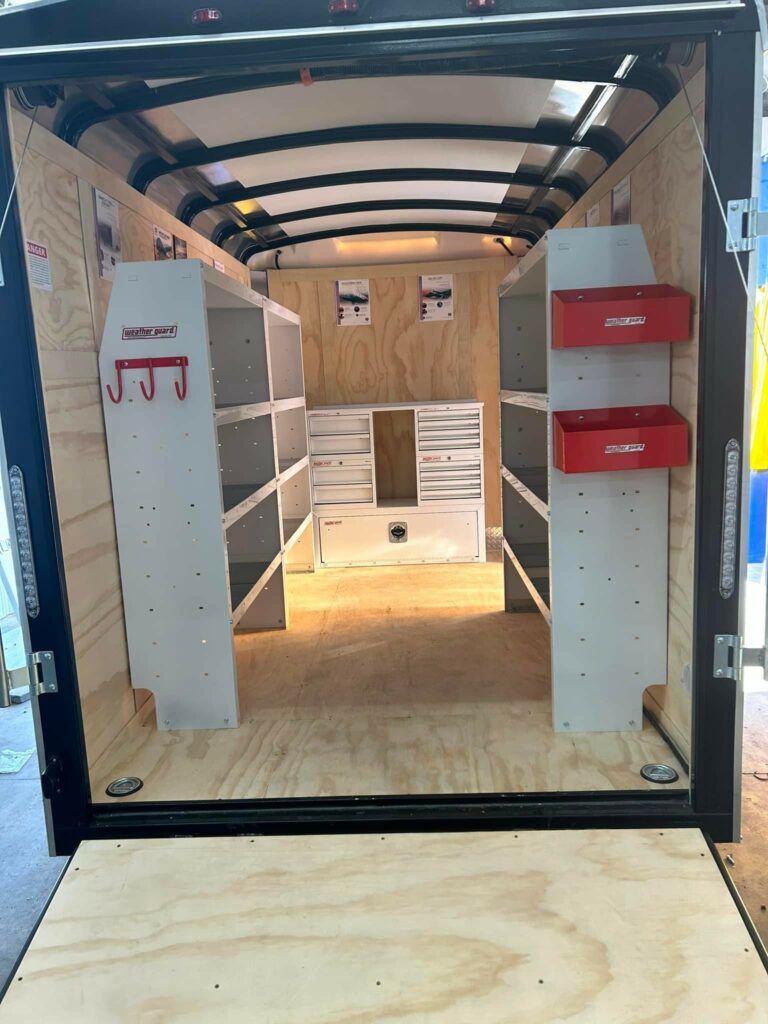 Weather guard shelving and drawers installed in trailer