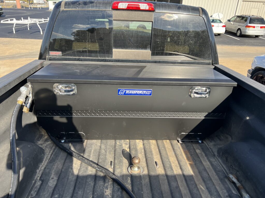 flow tank and pump installed in back of work truck